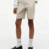 Baggy stretch chino-short met riem voor kinderen Baggy stretch chino-short met riem voor kinderen