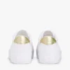 Canvas sneaker met metallic accenten Canvas sneaker met metallic accenten
