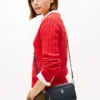 Crossbodytas met all-over reliëfmonogram Crossbodytas met all-over reliëfmonogram