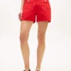 Denimshort met zakken met gouden knopen Denimshort met zakken met gouden knopen