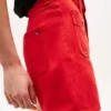 Denimshort met zakken met gouden knopen Denimshort met zakken met gouden knopen