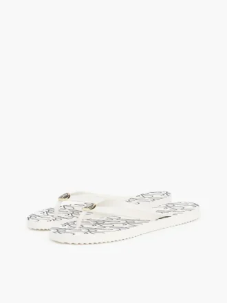 Flip-flops met metalen details en TH-scriptprint