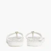 Flip-flops met metalen details en TH-scriptprint Flip-flops met metalen details en TH-scriptprint