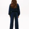 Jongens-joggingbroek met golvend vlaglogo Jongens-joggingbroek met golvend vlaglogo
