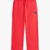 Jongens-joggingbroek met golvend vlaglogo Jongens-joggingbroek met golvend vlaglogo