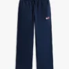 Jongens-joggingbroek met golvend vlaglogo Jongens-joggingbroek met golvend vlaglogo
