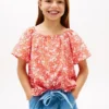 Kinder-top met tropische print en pofmouwen Kinder-top met tropische print en pofmouwen