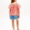 Kinder-top met tropische print en pofmouwen Kinder-top met tropische print en pofmouwen