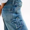 Kinderjeans met hoge taille en wijde pijpen met sterrenmotief Kinderjeans met hoge taille en wijde pijpen met sterrenmotief