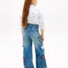 Kinderjeans met hoge taille en wijde pijpen met sterrenmotief Kinderjeans met hoge taille en wijde pijpen met sterrenmotief