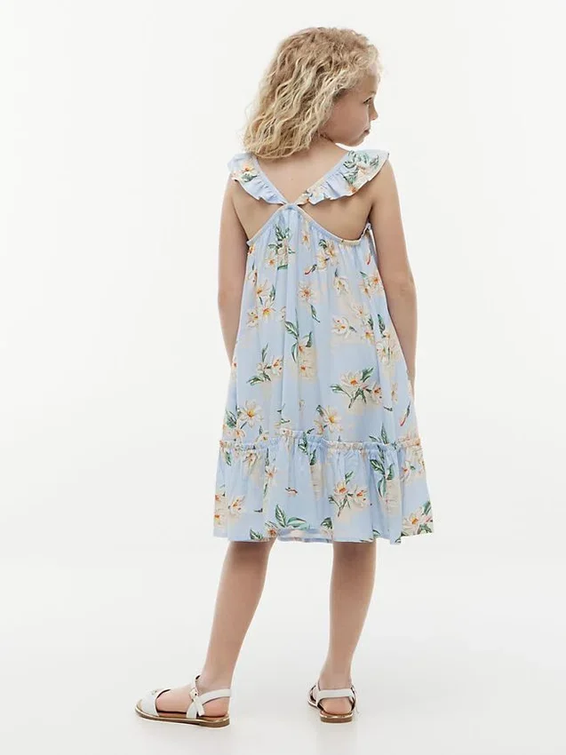 Kinderjurk met bloemenprint en ruches Kinderjurk met bloemenprint en ruches