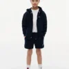 Korte broek met vlaglogo in dezelfde kleur voor kinderen