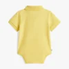 Polo-onesie voor baby’s en cadeauzakje Polo-onesie voor baby’s en cadeauzakje