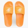 Poolslippers met geborduurd monogram Poolslippers met geborduurd monogram