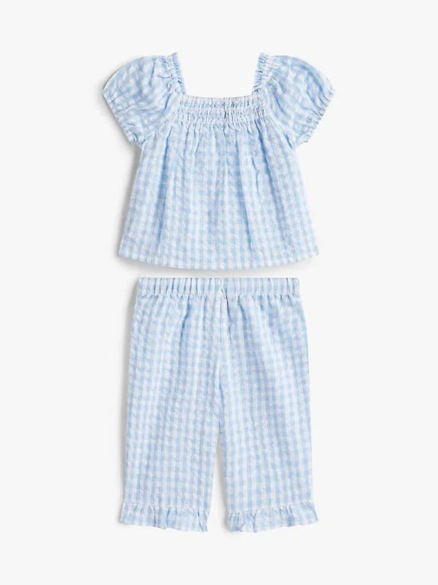 Set met geruite top en broek voor baby’s Set met geruite top en broek voor baby’s