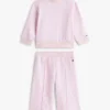 Set met sterren-topje en wijde broek voor baby’s Set met sterren-topje en wijde broek voor baby’s