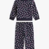 Set met sterren-topje en wijde broek voor baby’s Set met sterren-topje en wijde broek voor baby’s
