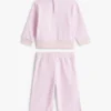 Set met sterren-topje en wijde broek voor baby’s Set met sterren-topje en wijde broek voor baby’s