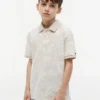 Stretchpolo met tropische print voor kinderen Stretchpolo met tropische print voor kinderen