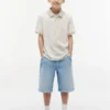 Stretchpolo met tropische print voor kinderen Stretchpolo met tropische print voor kinderen
