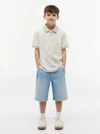 Stretchpolo met tropische print voor kinderen