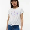 T-shirt voor kinderen met schelpenmotief en strik aan de voorkant T-shirt voor kinderen met schelpenmotief en strik aan de voorkant