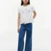 T-shirt voor kinderen met schelpenmotief en strik aan de voorkant T-shirt voor kinderen met schelpenmotief en strik aan de voorkant