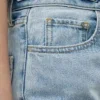 Tapered jeans met hoge taille Tapered jeans met hoge taille