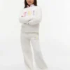 Tommy-broek met breed been en logo voor kinderen Tommy-broek met breed been en logo voor kinderen