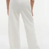 Tommy-broek met breed been en logo voor kinderen Tommy-broek met breed been en logo voor kinderen