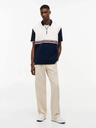 Tommy Jeans Relaxed Polo met kwartrits Tommy Jeans Relaxed Polo met kwartrits