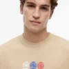 Tommy Jeans T-shirt met Multi-Crest-logo Tommy Jeans T-shirt met Multi-Crest-logo