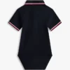 Tommy Wicking Polo-onesie voor baby’s Tommy Wicking Polo-onesie voor baby’s